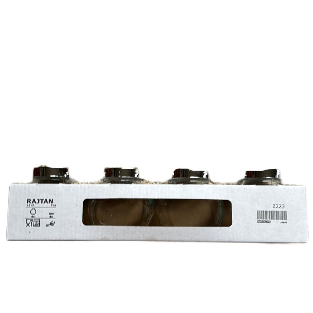 IKEA set of four Rajtan glass spice jars with silver lids